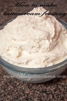 a bowl filled with whipped cream on top of a counter