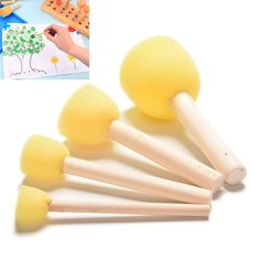 four wooden mallets with yellow foam balls on them and a photo of the same item