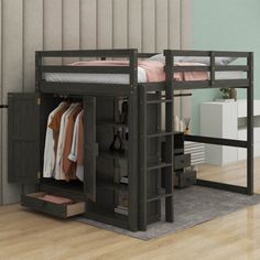 a bunk bed with drawers underneath it and clothes hanging on the rails below, in a room with hardwood floors