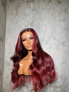 Hello! Feel free to message me directly anytime with questions or concerns! Contact  Business Phone number: +1 5085355694  Instagram: @slayedby_london Website www.londonsbeauties.com Product Details Unit Name : Ruby 100% European Virgin Human Hair HD lace (acceptable for all skin tones) Body wave Unit comes with bleached knots ready to wear! Lengths 20-36 (INCHES) Comes customized with Bleached knots and a pre-plucked hairline All wigs come with an adjustable wig band to ensure a snug fit. Shipp Wavy Wig, Wig With Red Skunk Stripe, Dark Red Wig, Skunk Stripe Lace Front Wig Red, Wig Red And Black, Dark Red Lace Front Wigs, Black Hair With Red Highlights, Black Red Hair, Red Highlights