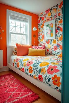 an orange and white bedroom with floral wallpaper on the walls, colorful bedding and rugs