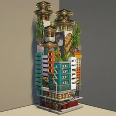 a tall building with lots of windows and plants on it's side, next to a wall