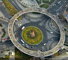 an aerial view of a busy intersection in the city