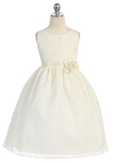 a white flower girl dress on a mannequin