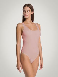 Beauty Cotton Bodysuit | Wolford United States Upgrade your wardrobe with our stylish collection of women's bodysuit tops. Perfect for dressing up or down, our bodysuits come in a variety of styles, colors, and fabrics to suit any occasion. Check out our board for outfit ideas and tips on how to style bodysuits to perfection. Let's add some versatility and sophistication to your wardrobe! #BodysuitTops #WomensFashion #StyleInspiration Represent Clothing, Designer Tights, Cotton Bodysuit, Pinterest Pin, Womens Bodysuit, How To Style, Pink Fashion, Hosiery