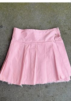 Denim, we love it. The Phobya Miniskirt, now as a Cupyyd In Soft Pink - just in time for summer. Hand crafted from top-quality sustainable denim and completely unique. Finished with the statement Safety Pin Closure. This skirt is designed to be uniquely worn, adjusting the pins to the wearer. - Safety Pin closure - One piece wrap skirt design - Micro-mini pleated skirt style - low-rise fitted waist - Pre-washed   - Sustainable dead-stock denim  - Available in grey and blue Y2k High Waist Cotton Skort, Spring Cotton Pleated Skort, High Waist Pleated Cotton Denim Skirt, High Waist Cotton Denim Pleated Skirt, High Waist Pleated Denim Skirt In Cotton, High-waist Cotton Pleated Denim Skirt, Y2k Mini Cotton Skort, Trendy Summer Cotton Skirt, Trendy Cotton Summer Skirt