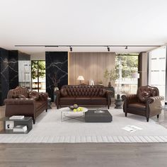 a living room filled with furniture and a white rug on top of a hard wood floor