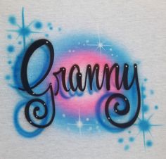 the word granny written in black ink on a white t - shirt with blue and pink swirls