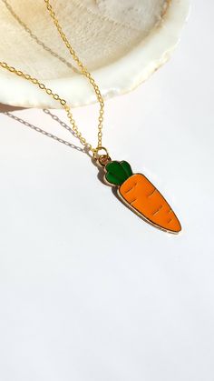 New Minimalist 14k Gold Plated Carrot Cute Vegetable Charm Necklace Handmade Jewellery Add a touch of playful charm to your look with this delightful minimalist carrot necklace from Chic Chick Boutique. Plated with 14k gold, the necklace features a cute enamel carrot charm, adding a whimsical and unique touch to any outfit. Handmade in the United Kingdom, the necklace is adjustable to fit various neck sizes (42cm base + 5cm), ensuring a comfortable fit. Perfect as a gift for her--whether for bir Carrot Necklace, Handmade Jewelry Gift, How To Make Shorts, Jewellery Gift, Necklace Handmade, Handmade Jewellery, The United Kingdom, Handmade Necklaces, Bracelet Making