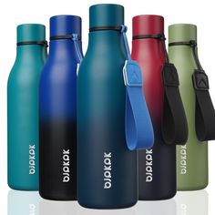 thermos bottles are lined up next to each other