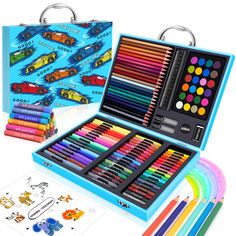 an assortment of colored crayons in a blue box with matching pencils and markers