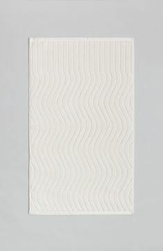 A wiggly ribbed pattern inspired by reverberations of skimmed water puts subtle texture under your feet on this soft, plush organic-cotton bath mat. 31" x 19" 100% organic cotton Machine wash, tumble dry Imported Bathing Routine, Modern Towels, Time Routine, Guest Toilet, Cotton Bath Mats, Cotton Hand Towels, Guest Gifts, Big Gifts, Checkerboard Pattern