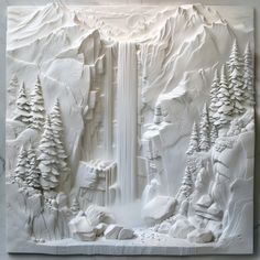 a paper sculpture of a waterfall surrounded by snow covered trees and rocks, with mountains in the background