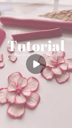 the video shows how to make flowers with fondant and piping on cake decorating supplies