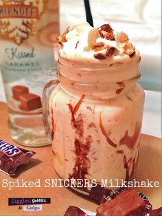 a glass jar filled with ice cream and chocolate