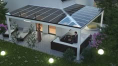 an artist's rendering of a house with solar panels on the roof and lawn