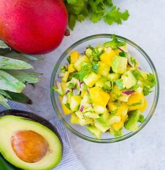 avocado and mango salad with limes on the side