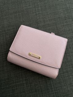 Fendi Trifold Baby Pink and Blue Wallet.  Comes with authenticity card (seen in photo) and dust bag (no box)! Originally bought for $1000+ Condition is "Pre-owned". Shipped with USPS First Class. Pink Bifold Wallet For Daily Use, Pink Bifold Wallet With Card Slots, Luxury Pink Bifold Wallet, Pink Leather Compact Wallet, Blue Wallet, Fendi Wallet, Trifold Wallet, First Class, Baby Pink