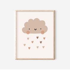 a white framed wall hanging with a cute cloud and hearts on it's side