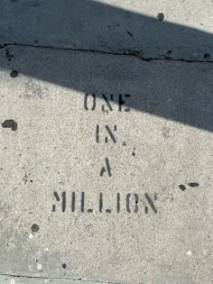 one in a million written on the sidewalk