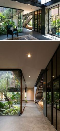 the inside and outside of a house with glass walls