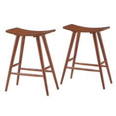 two wooden stools sitting next to each other