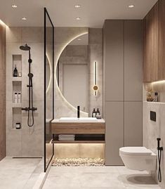 a bathroom with a toilet, sink, and shower stall in it's center