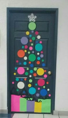 a door decorated with christmas decorations and presents