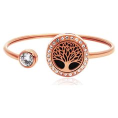 This stainless steel aromatherapy diffuser bracelet features a tree of life pattern and encrusted rhinestones all around the locket bracelet. An irresistible gift for all aromatherapy enthusiasts, jewelry lovers, or holiday shoppers. This gift set makes it easy for anyone to experience the benefits of aromatherapy jewelry. Our essential oil bracelet comes with an instruction card, and an Anavia Signature Gift Box. This gift set makes the perfect gift for the holiday season and introducing friend Oil Bracelet, Tree Of Life Pattern, Essential Oil Gift Set, Essential Oil Bracelet, Essential Oil Jewelry, Gifts Box, Aromatherapy Bracelet, Oil Diffuser Bracelet, Aromatherapy Jewelry