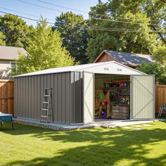 a storage shed with its doors open in the yard