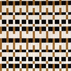 an area rug with black and brown squares on it