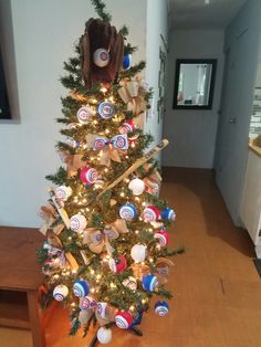 a christmas tree decorated with lollipops and candy