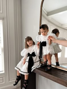 Petite Maison Kids. Ethically produced gorgeous work of art dress. Ivory velour dress with satin inserts. Large contrast bow in center. Tulle puff sleeves. Hand embroidery on bodice and sleeves. 95% Luxe Polyester, 5% Silk. 100% cotton lining. Tulle Puff Sleeves, Aurora Hair, Matching Outfit Ideas, Black Tie Events, Baby Girl Style, Velour Dress, Ivory Fabric, Matching Outfit, Christmas Photoshoot