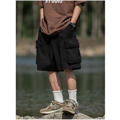 N-285-25 Casual Black Athletic Shorts For Summer, Black Shorts With Pockets For Summer, Techwear Bottoms For Outdoor Activities In Summer, Summer Techwear For Outdoor Activities, Summer Techwear Bottoms For Outdoor Activities, Urban Style Summer Outdoor Bottoms, Baggy Shorts For Summer Outdoors, Black Cargo Shorts With Elastic Waistband, Baggy Shorts For Summer Outdoor Activities