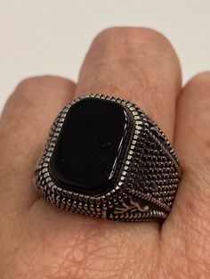 One of a kind piece in size 10. Fine details worked into the stainless steel casting. gorgeous cut of black onyx Steel rings can not be re sized. All jewelry is shipped in a nice gift box. Check out our over a THOUSAND great reviews Engraving is $4 per letter and is not always perfect depending on the piece. It can take a few days if the jeweler is busy. This is payable to Paypal Judithsltd@gmail.com Modern Onyx Signet Ring For Gift, Modern Onyx Signet Ring Gift, Black Sterling Silver Signet Ring With Polished Finish, Silver Onyx Signet Ring Gift, Rectangular Onyx Signet Ring Gift, Silver Onyx Gemstone Signet Ring, Black Stainless Steel Rings For Gift, Modern Black Jewelry With Black Enamel, Black Onyx Jewelry For Formal Occasions