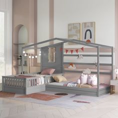 a child's bedroom with pink walls and flooring, including a gray bed frame