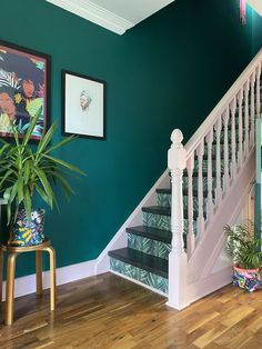 the stairs in this house are painted bright green