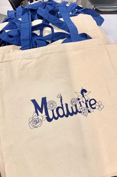 "Unique and Beautiful Midwife Tote Bag with flower accented design. Measuring 15\"W x 16\"H with 23\" handles." Nursing Wallpaper, Nurse Outfit Scrubs, Nurse Outfit, Career Lifestyle, Plans For The Future, Merch Aesthetic