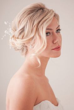 a woman with blonde hair wearing a wedding dress and looking off to the side in an instagram