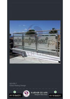 an image of a metal fence with decorative designs on it