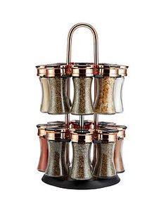 four tiered spice dispenser with copper accents