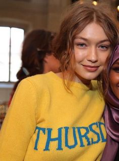 two young women standing next to each other