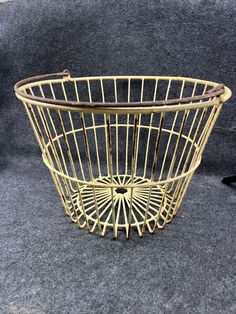 Large Vtg Old Metal Wire Basket w Handle Rustic country farmhouse decor. MCM mid-century Great for displaying and storing: greenery, flowers, eggs, firewood, fruit, vegetables, Christmas, blankets, pillows, towels, etc See photos for measurements. ***Condition: Vintage. Preowned. Signs of age. Considerable amount of Rust. The off-white paint color is yellowed and aged. See photos for details. Please message with any questions. Thanks for shopping! We reuse packing and shipping supplies. Vegetables Christmas, Off White Paint Colors, Metal Wire Basket, Off White Paint, Rustic Country Farmhouse, Greenery Flowers, Off White Paints, Old Metal, White Paint Colors