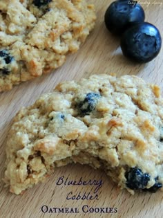 blueberry cobble oatmeal cookies on a cutting board with fresh blueberries