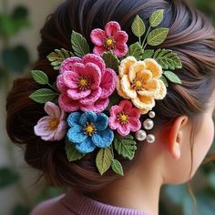 a close up of a woman with flowers in her hair