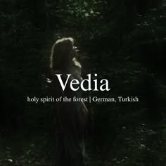 a woman standing in front of trees with the words vedia written above her head