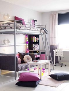 a loft bed is in the middle of a room with white walls and flooring