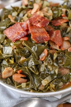 collard greens with bacon in a white bowl