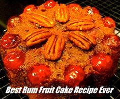 a cake that is sitting on top of a rack with the words best run fruit cake recipe ever