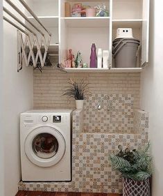 a washer and dryer in a small room